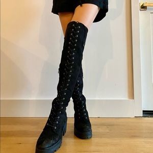 Black over the knee boots with heels, 23eye lace up closure Zipper at inner side